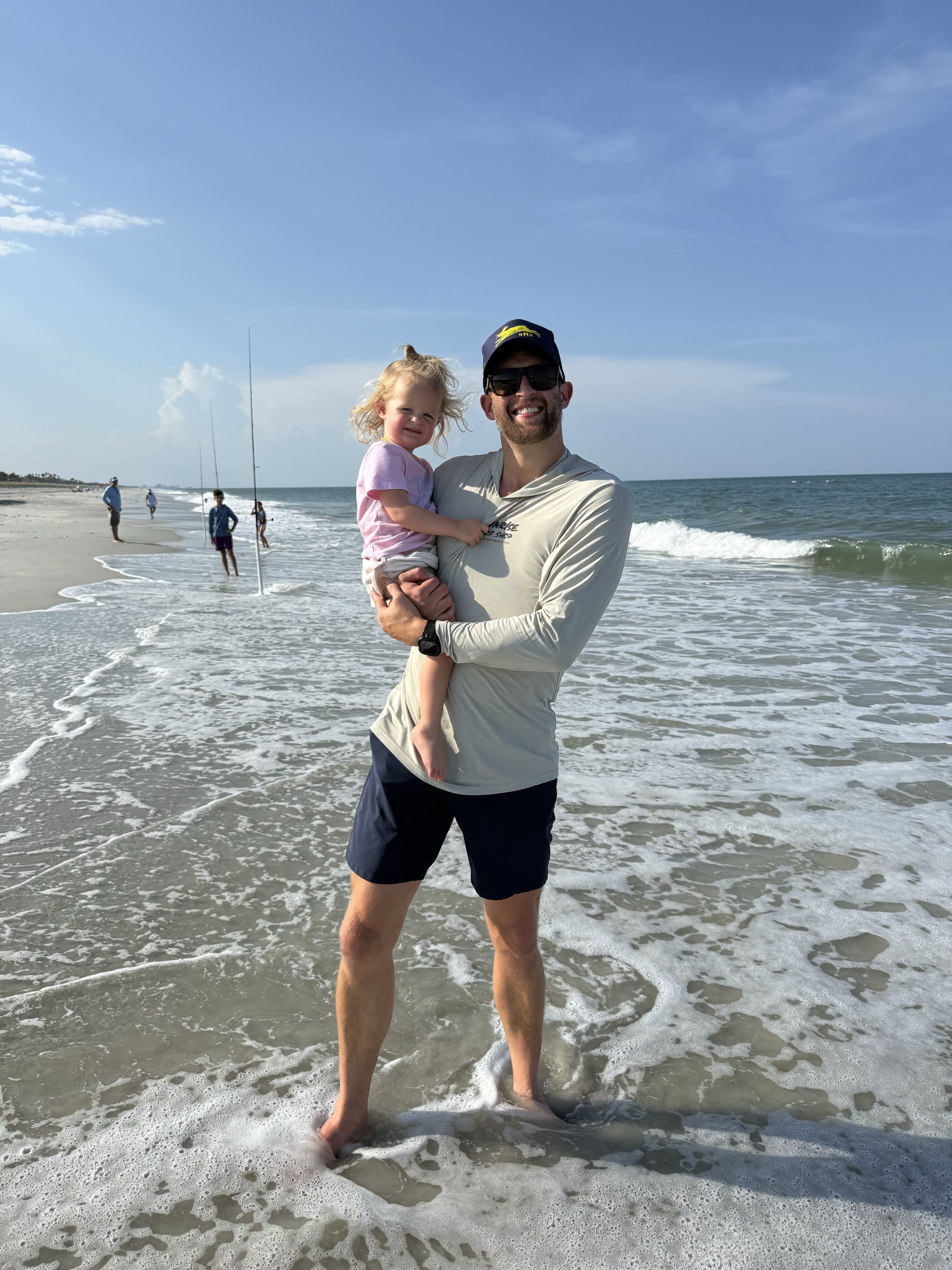 Israel at the beach with his daughter