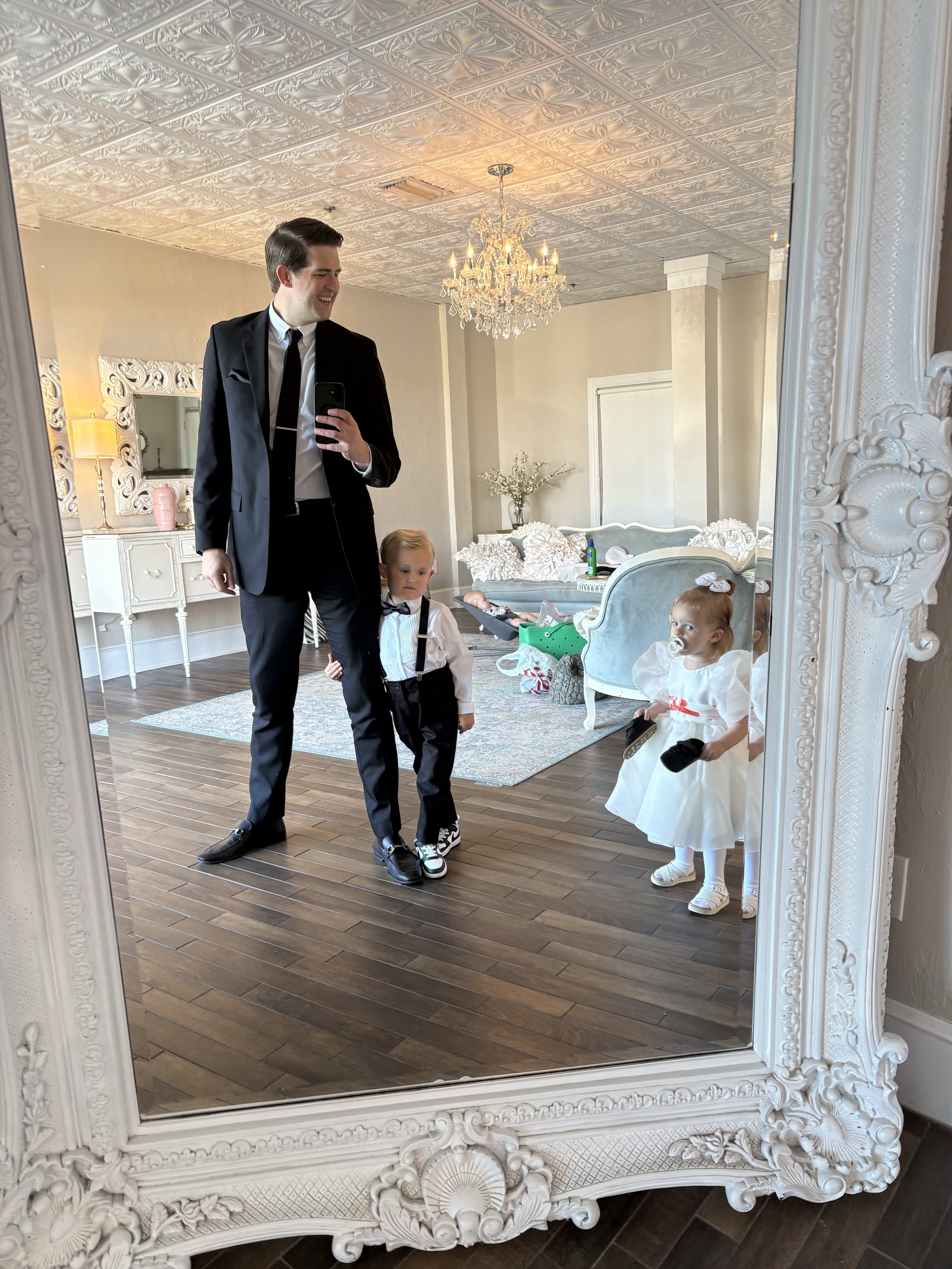Israel dressed up with his children before an event